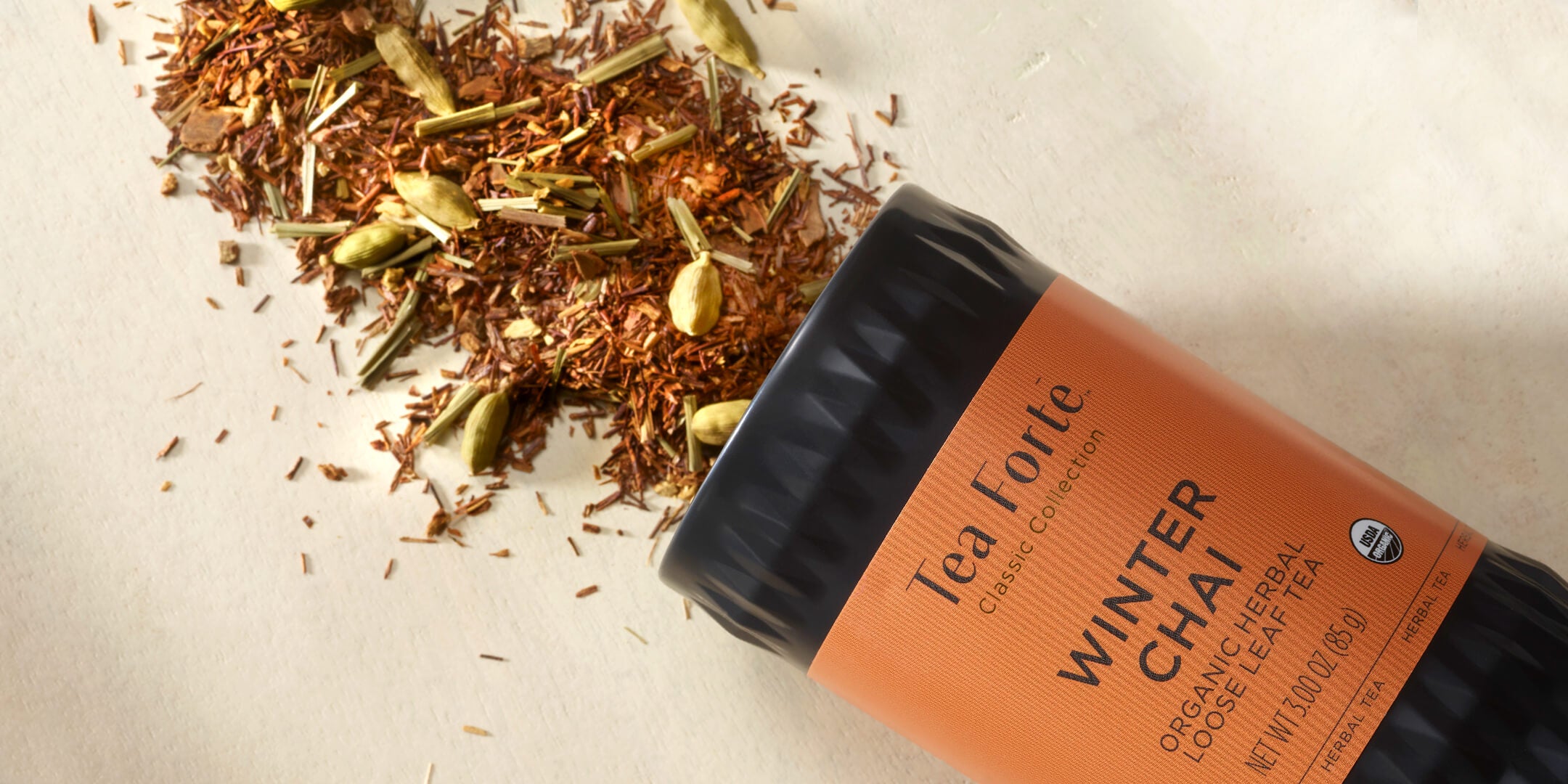 Winter Chai Loose Tea Canister with loose tea leaves spilling out