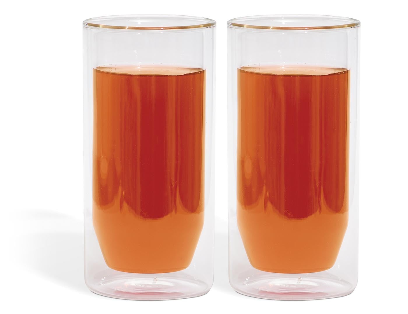 Two double-walled glasses with brewed tea inside each