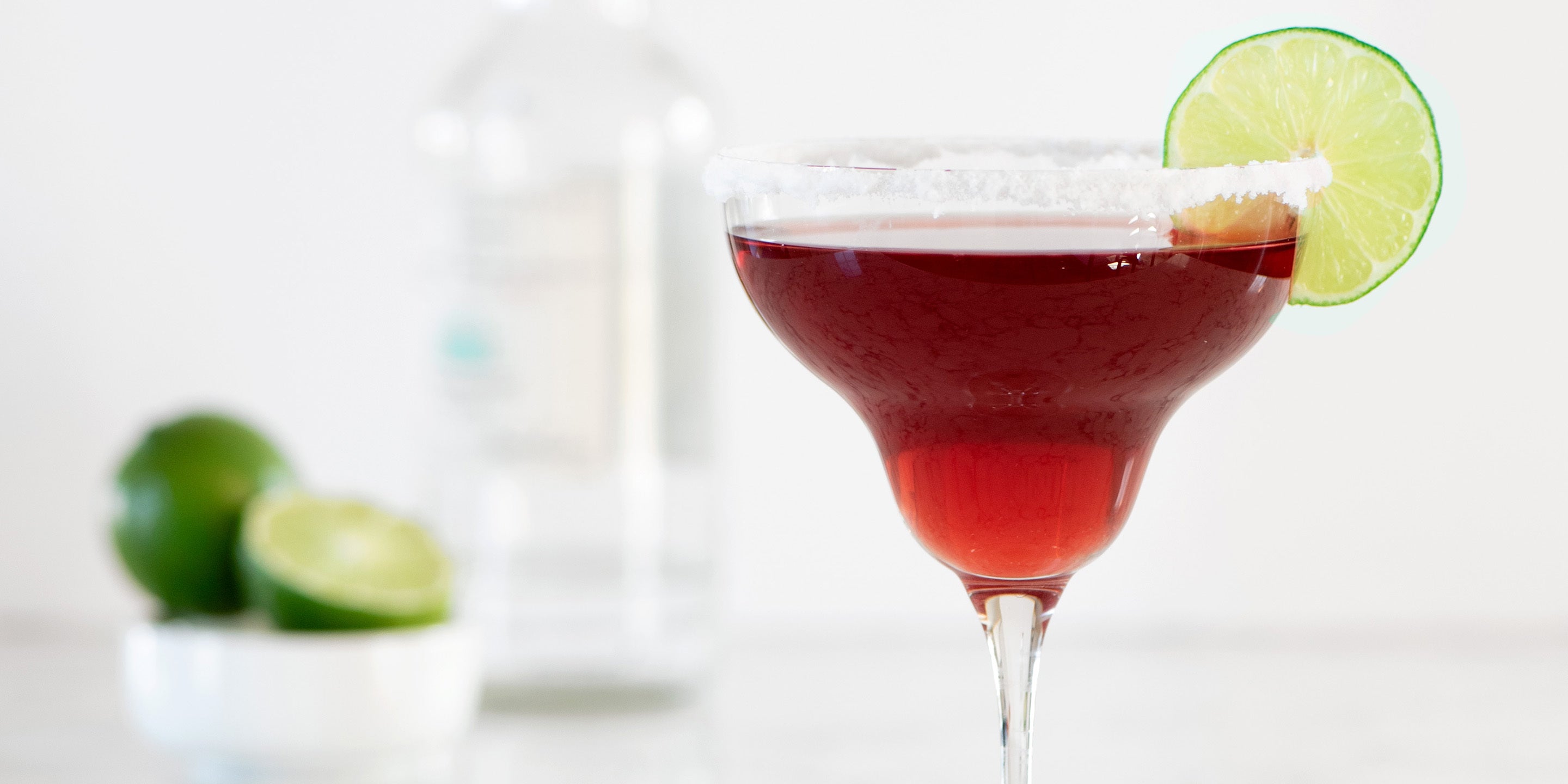 Hibiscus Blossom Margarita with lime slice