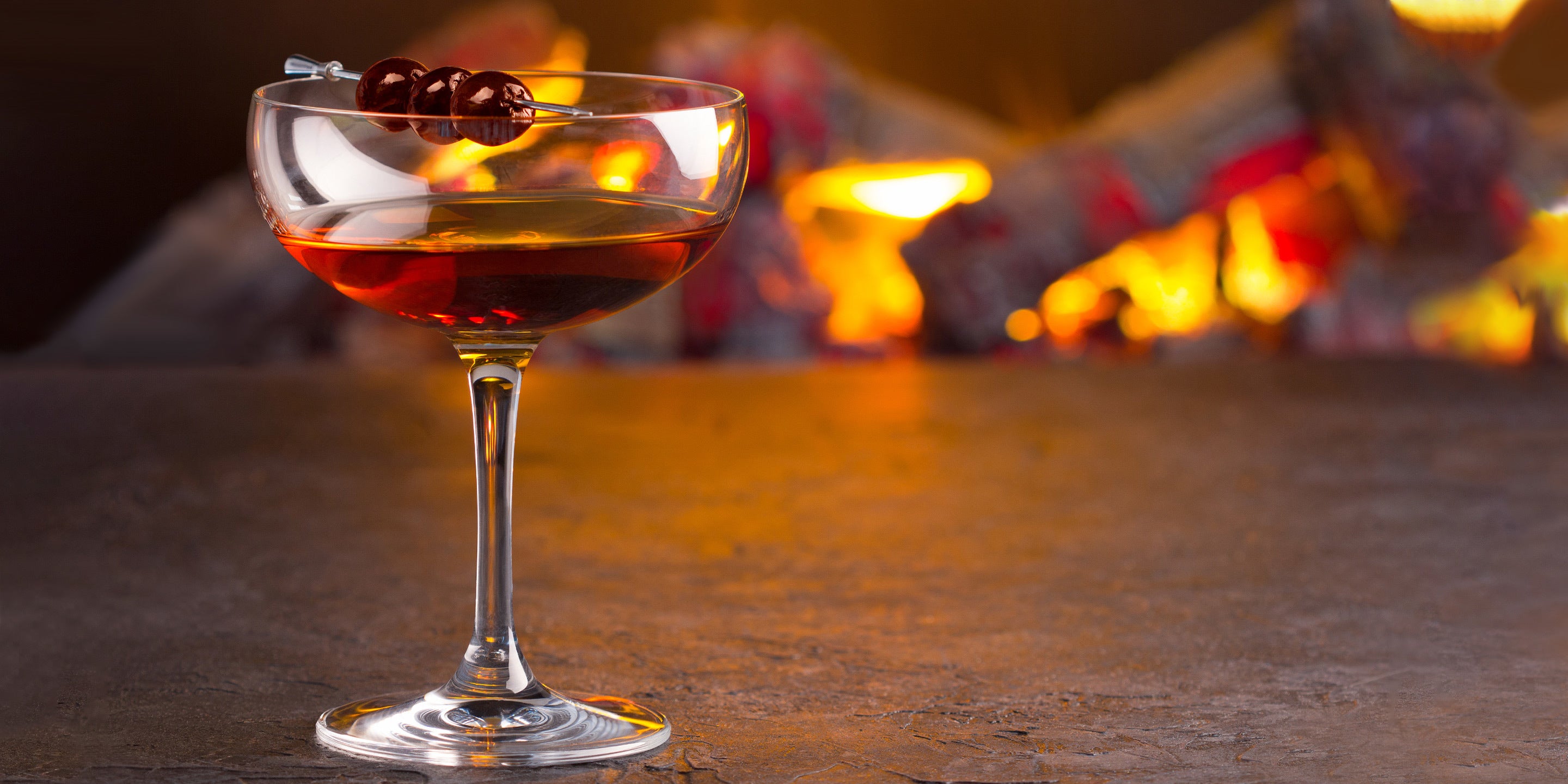 Pumpkin Spice Manhattan in a martini glass