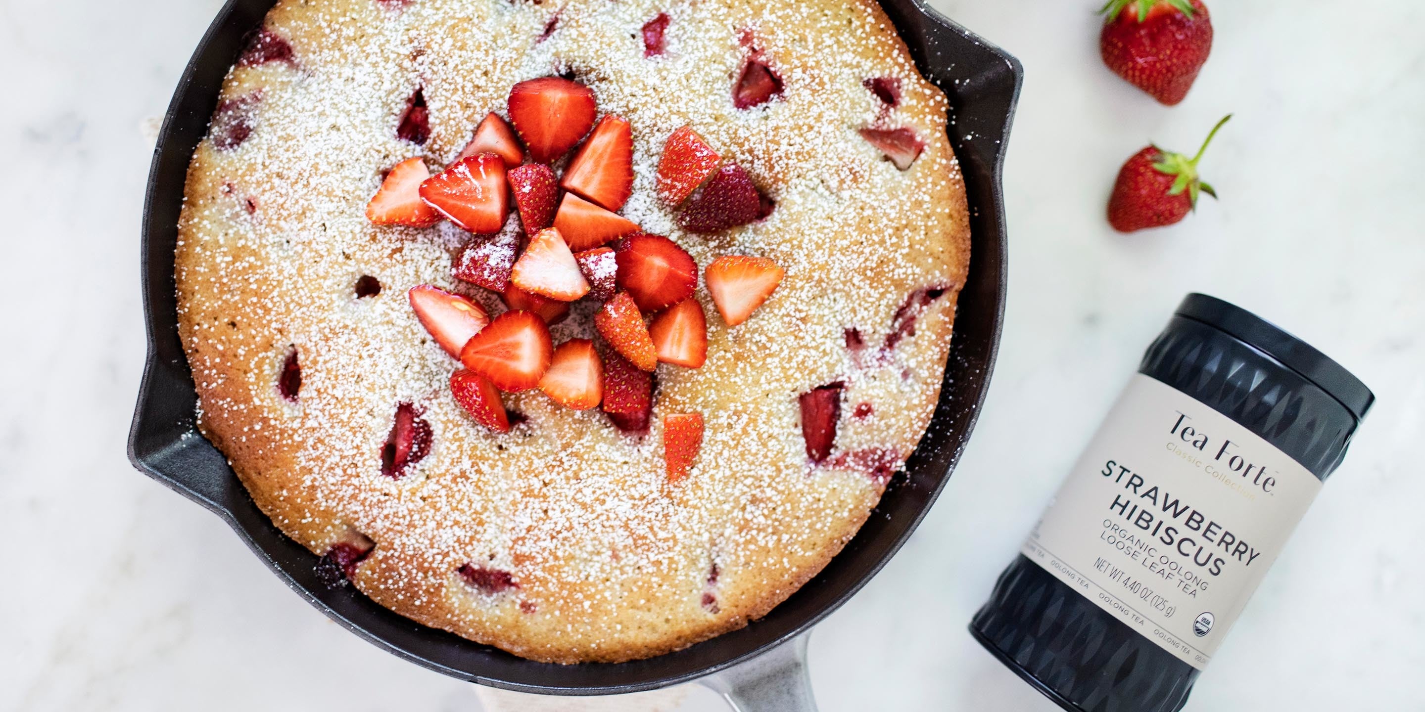 Strawberry Hibiscus Skillet Cake with loose tea canister