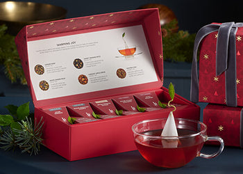 Warming Joy Petite Box, open with cup of tea