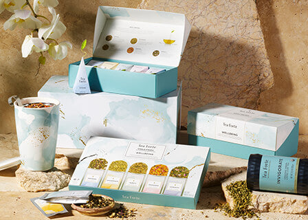Wellbeing Collection items displayed on a stone background