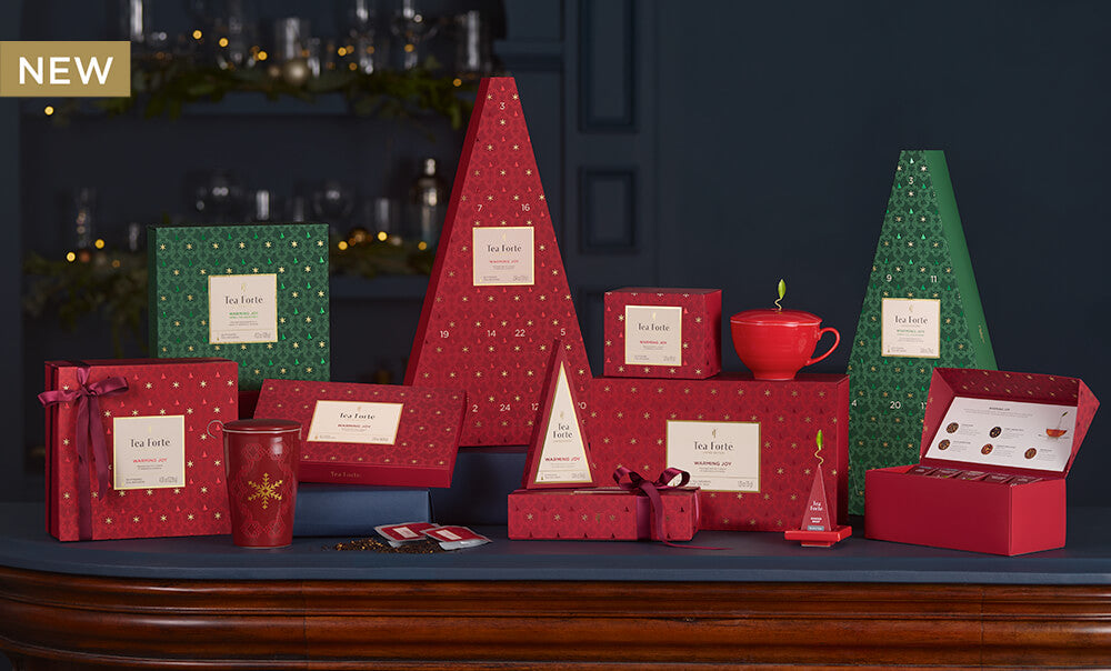 Warming Joy Collection of festive red & green items in a dark blue room