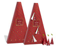 Two rWarming Joy red advent calendars with gold diagonal stripes and gold numbers, shown on a white background. Several small tea infusers are placed in front of the calendars.