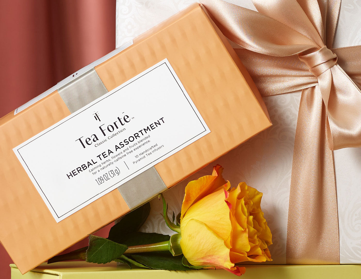 MAIN PDP | Herbal Tea Assortment petite on 10 teas  closed box with flowers and a wrapped gift