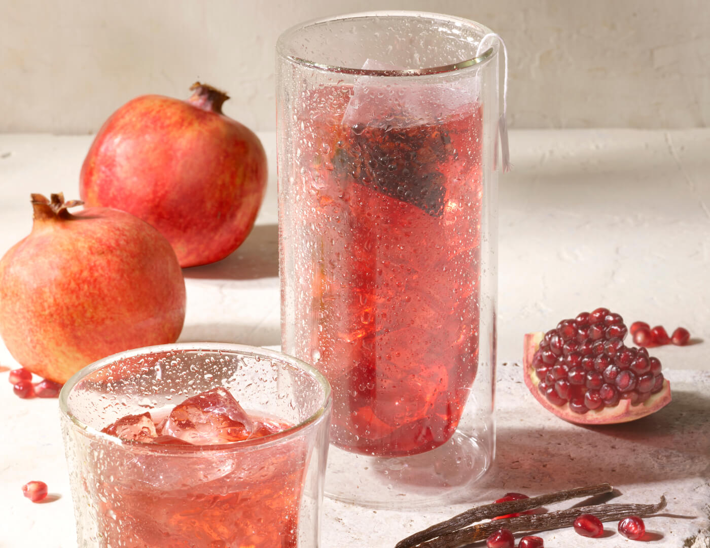 Cold Brew Pomegranate Vanilla sachet steeped in ice water