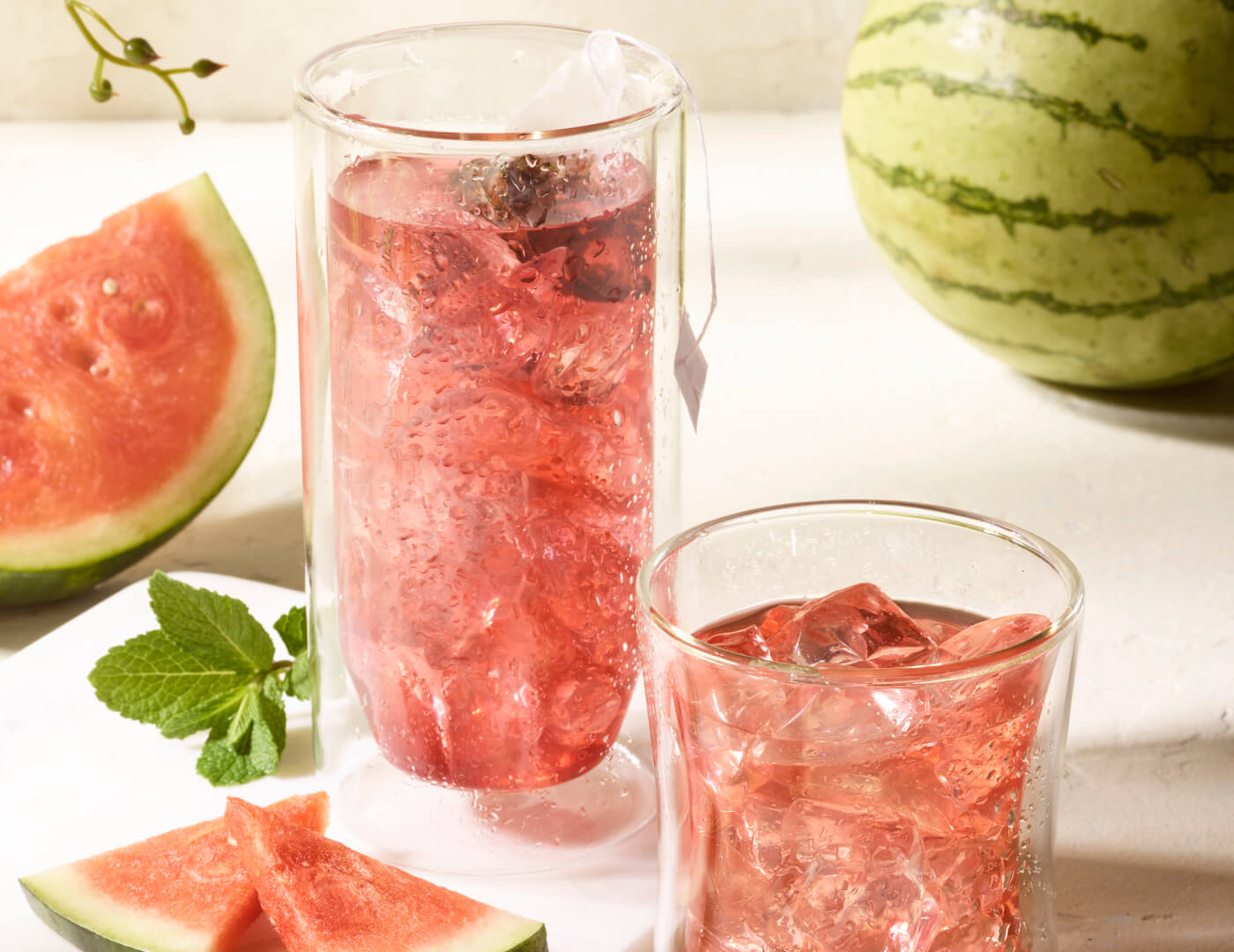 Cold Brew Watermelon Mint sachet steeped in ice water