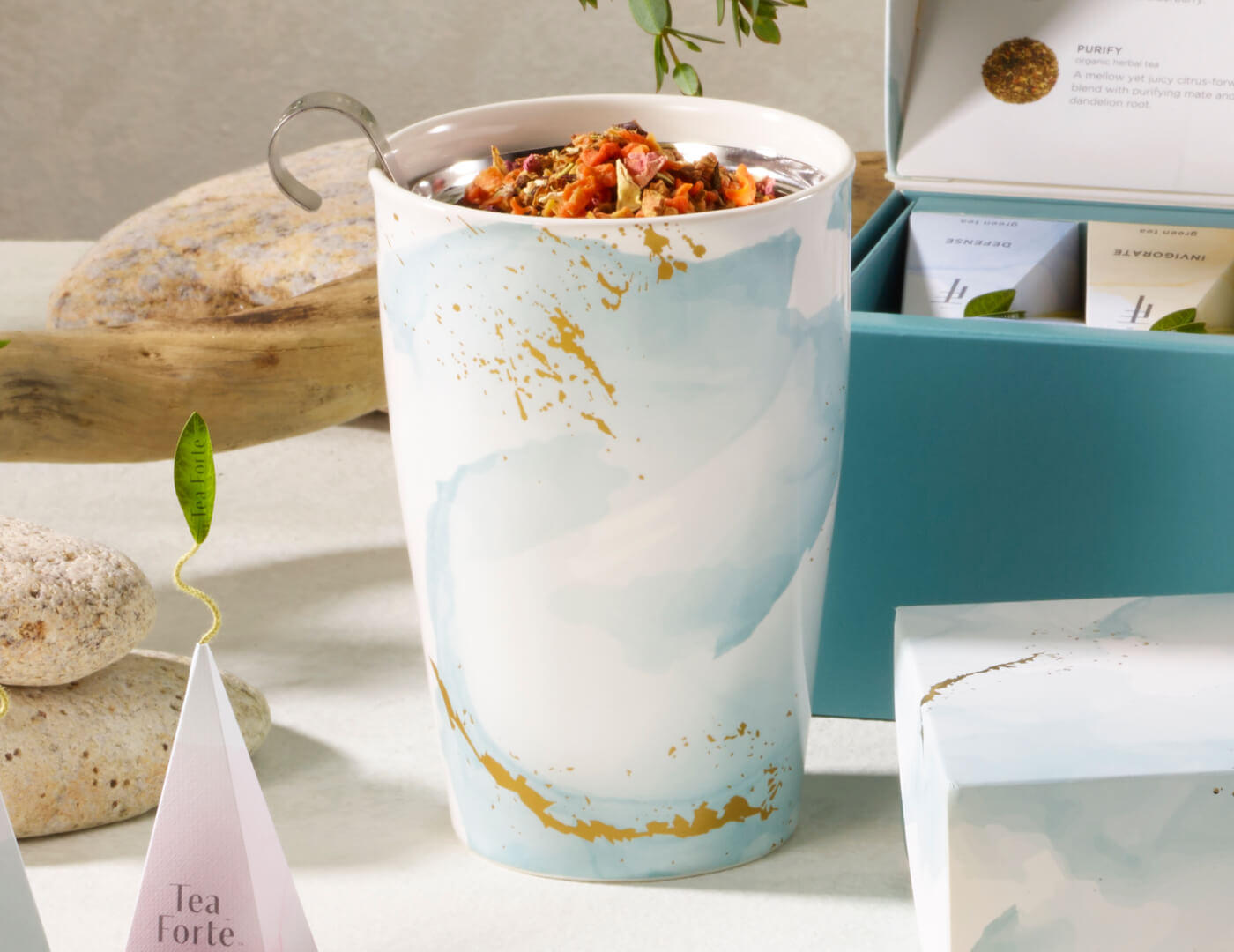 Wellbeing Kati Steeping Cup with open lid and loose tea inside