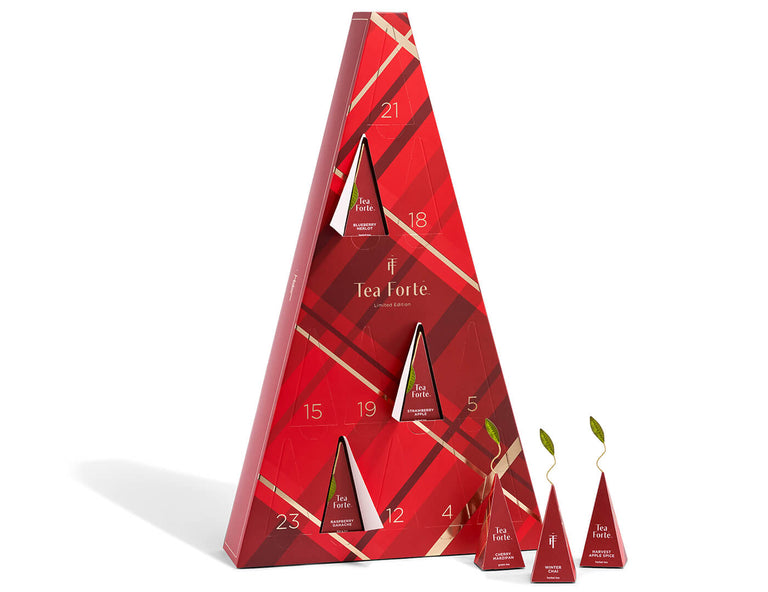 Warming Joy Advent Calendar with pyramid infusers and several open doors revealing more pyramid tea infusers