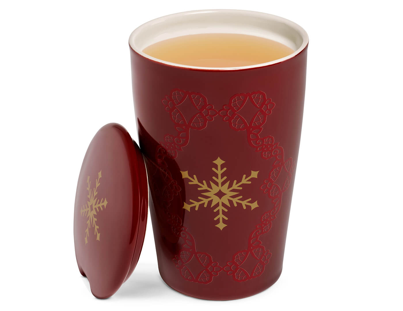 Warming Joy KATI Steeping Cup with hot tea inside and the cover off to the side