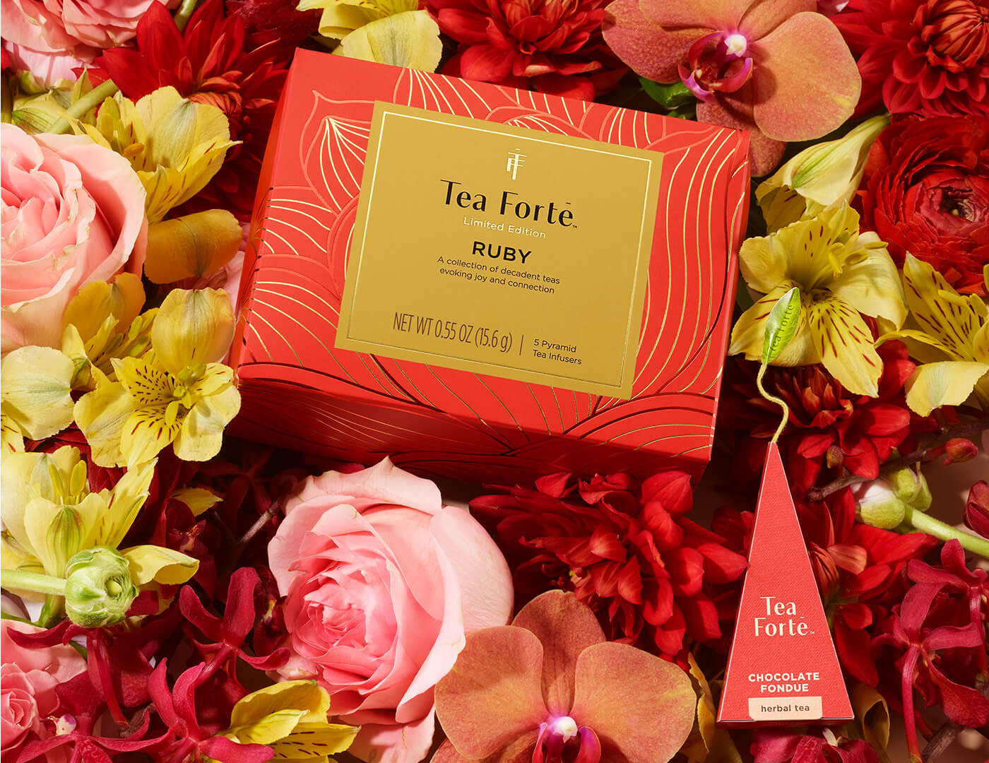 Ruby Mini Petite Box of 5 teas, surrounded by flowers