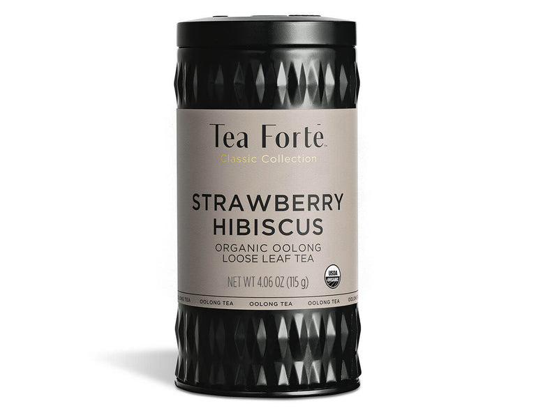 Strawberry Hibiscus tea in a canister of loose tea