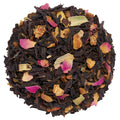 Loose leaf tea blend with black tea leaves, yellow and pink flower petals, and dried citrus pieces.