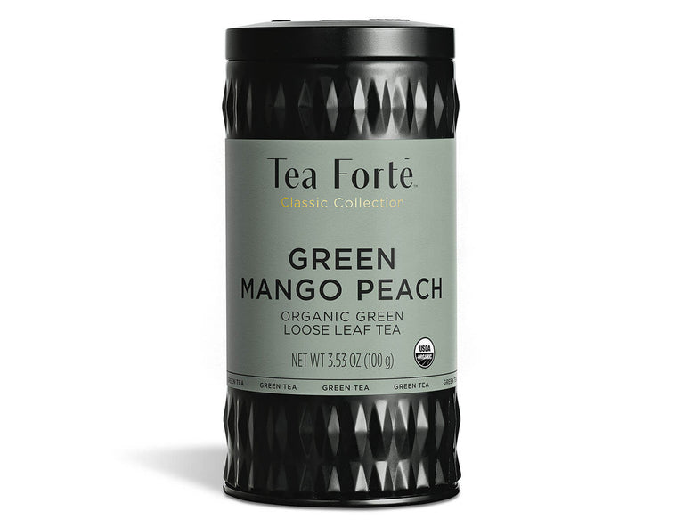 Green Mango Peach tea in a canister of loose tea