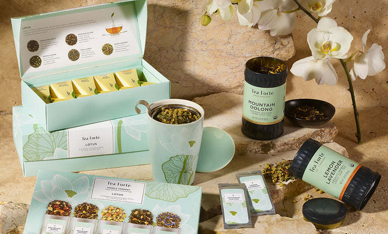 Lotus Tea Collection boxes and loose leaf tea with orchid  flower