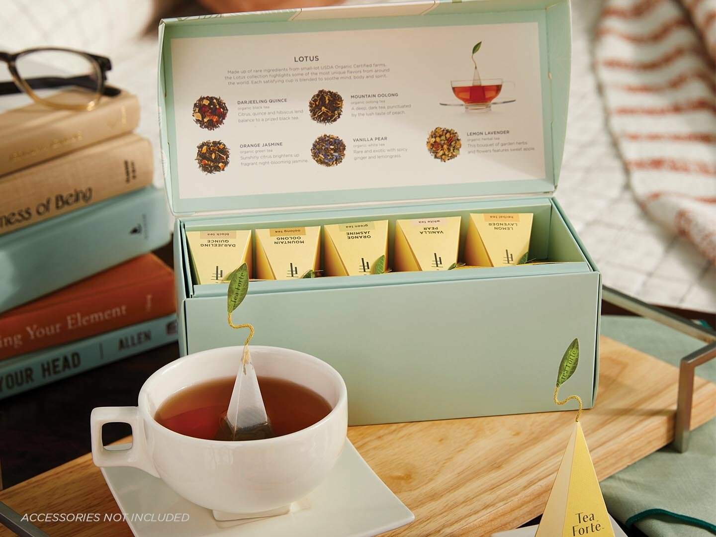 Lotus Presentation Box, open, with a teacup
