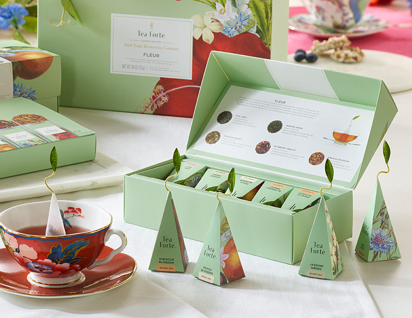 Fleur tea assortment in a 10 count petite presentation box on table