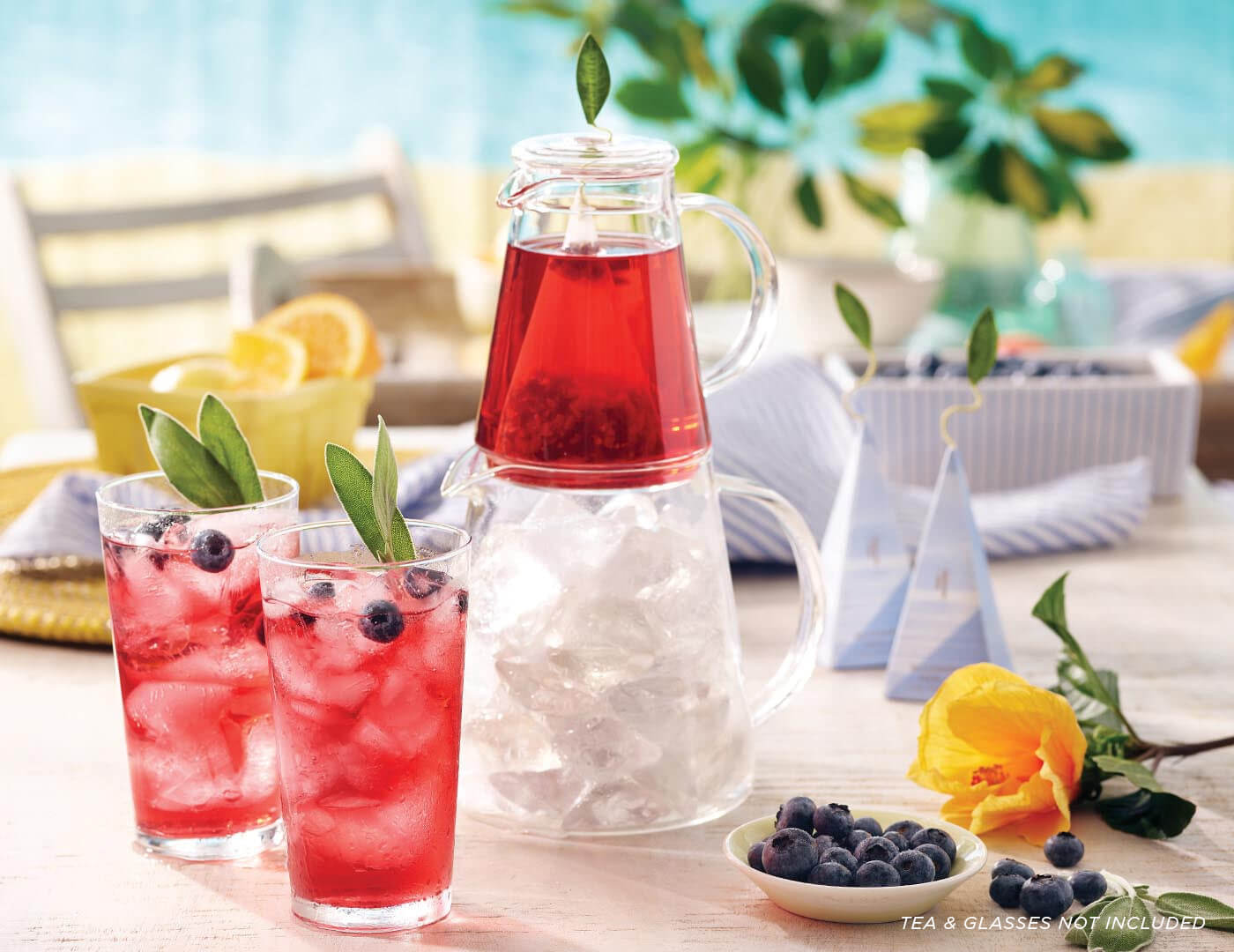 Image of Tea Over Ice Pitcher Set next to Glasses